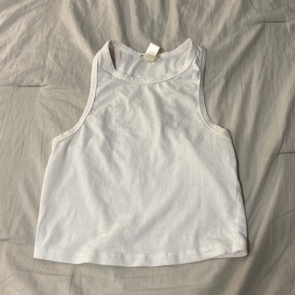 White cotton racer back tank top. Size medium. Brand is bozzolo